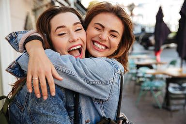 Close-up,Photo,Of,Laughing,Woman,Friends,Hugging,Each,Other,On