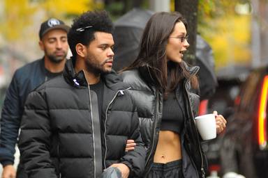 Model Bella Hadid and The Weeknd out for a Walk on a Rainy Day
