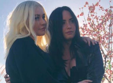 Christina Aguilera y Demi Lovato, mujeres de acción en el vídeo de "Fall in line"